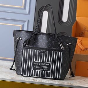 Louis Vuitton Elegant Black Tote with Striped Pocket